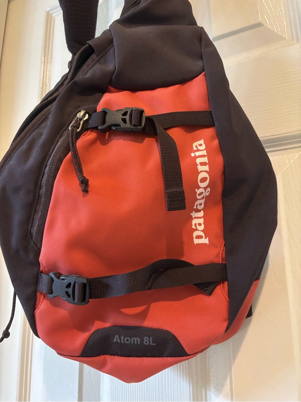 Patagonia Atom 8L Sling Bag in Red and Black